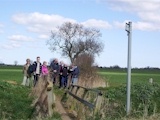 Seven of our group near a footbridge on footpath 93.